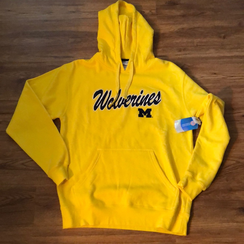 New University of Michigan yellow hoodie, size men’s medium.
